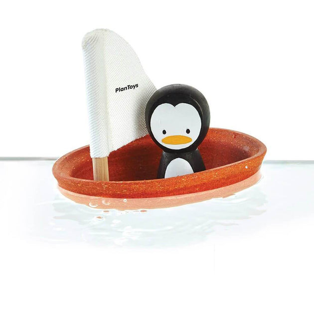 PLAN TOYS - Jouet bateau en bois pingouin - Jouet de bain en bois �?? French Blossom